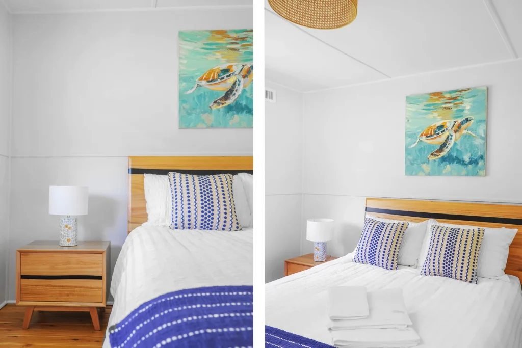 Bright bedroom with turtle art and timber furniture at Charm, Hyams Beach