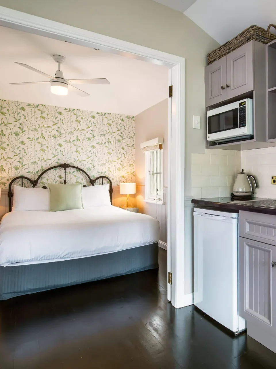 Studio kitchen and elegant bedroom at Cottage 3 at Hyams Beach