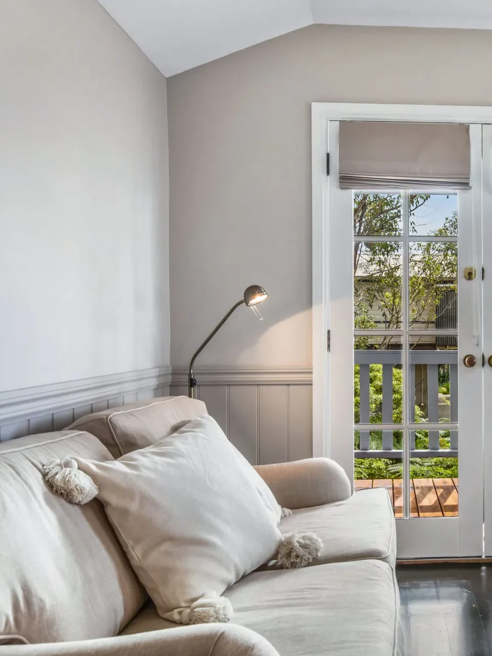 Cozy lounge with garden terrace access at Cottage 3 at Hyams Beach