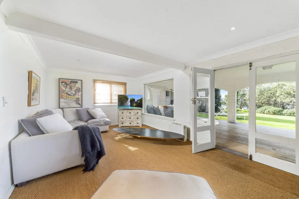 Elandra, Hyams Beach living area opening to patio