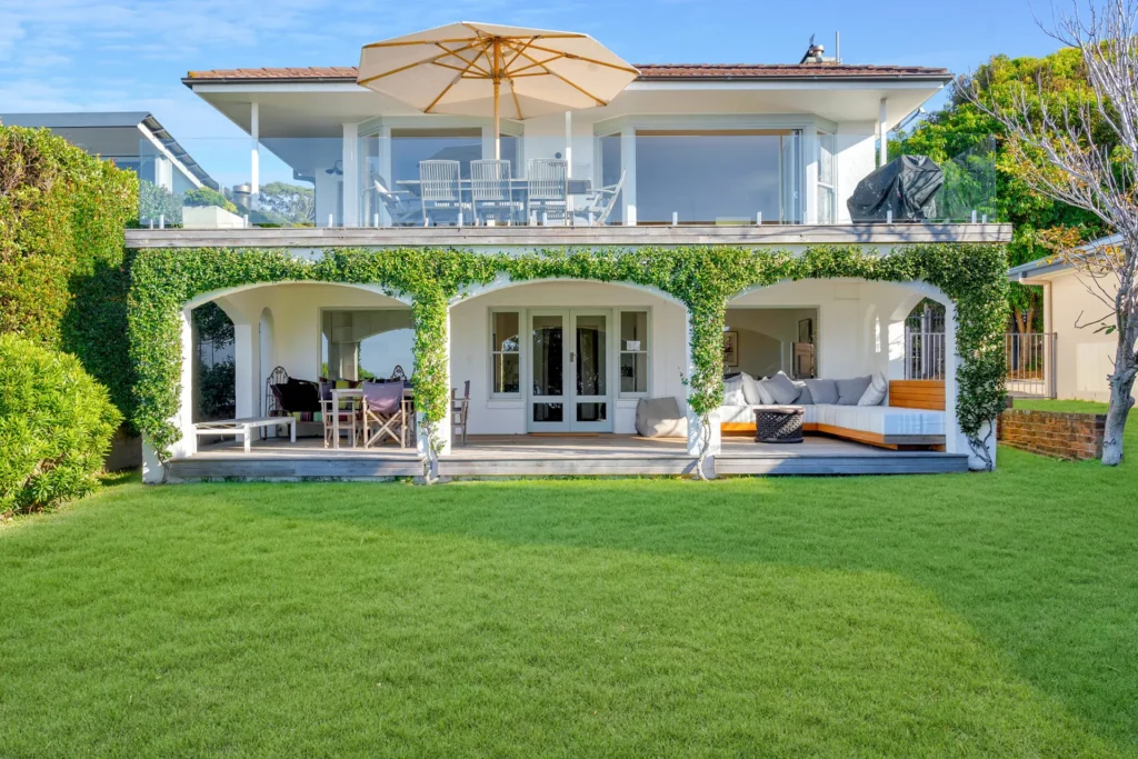Elandra, Hyams Beach exterior with lawn and balcony