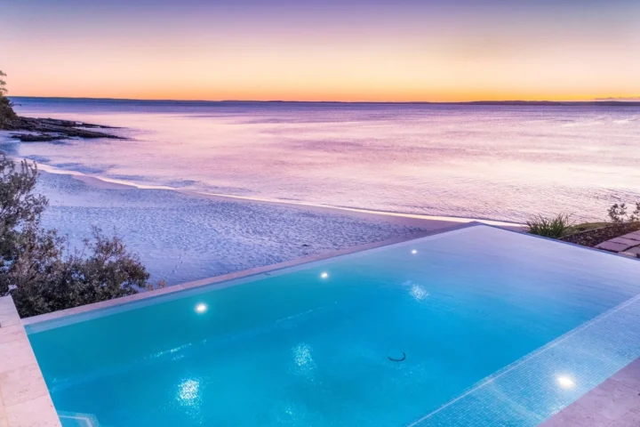 Stunning infinity pool overlooking the bay at Horizons at Hyams Beach