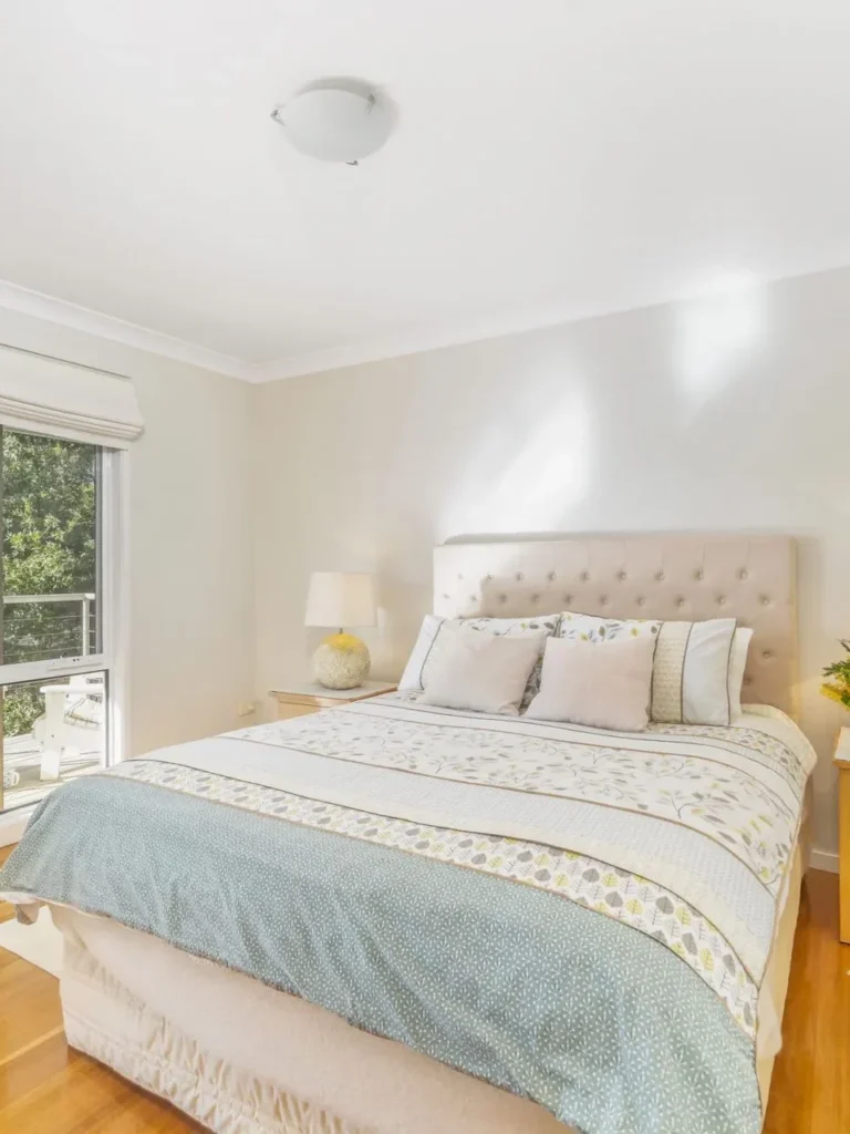 Elegant master bedroom with neutral tones at Iluka