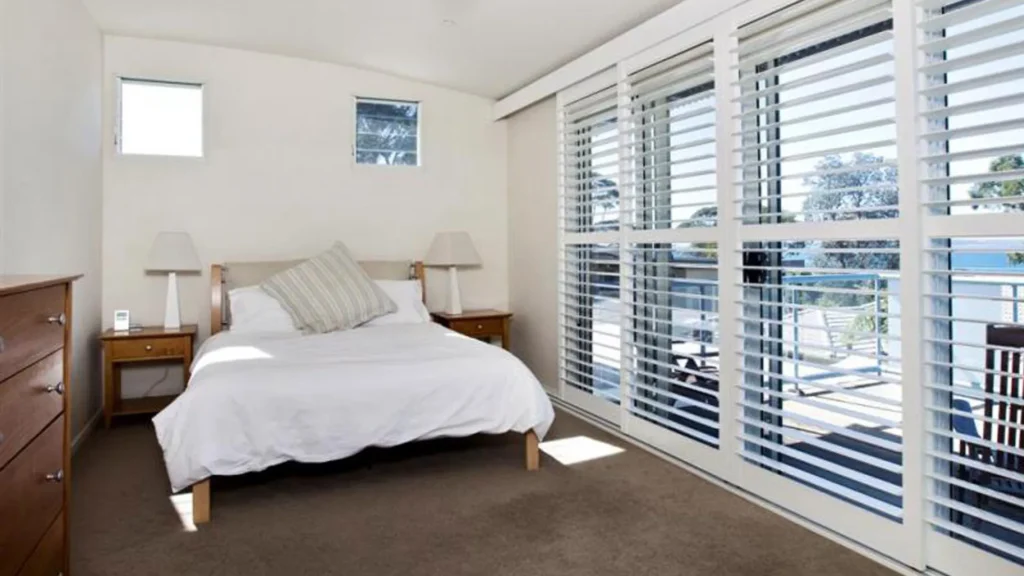Sun-drenched bedroom at Shorelines at Hyams Beach