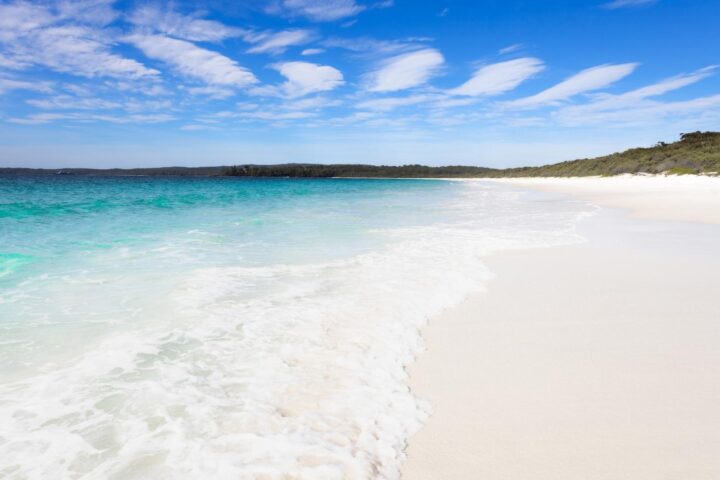 Waves and white sand on Hyams Beach Trail in Australia