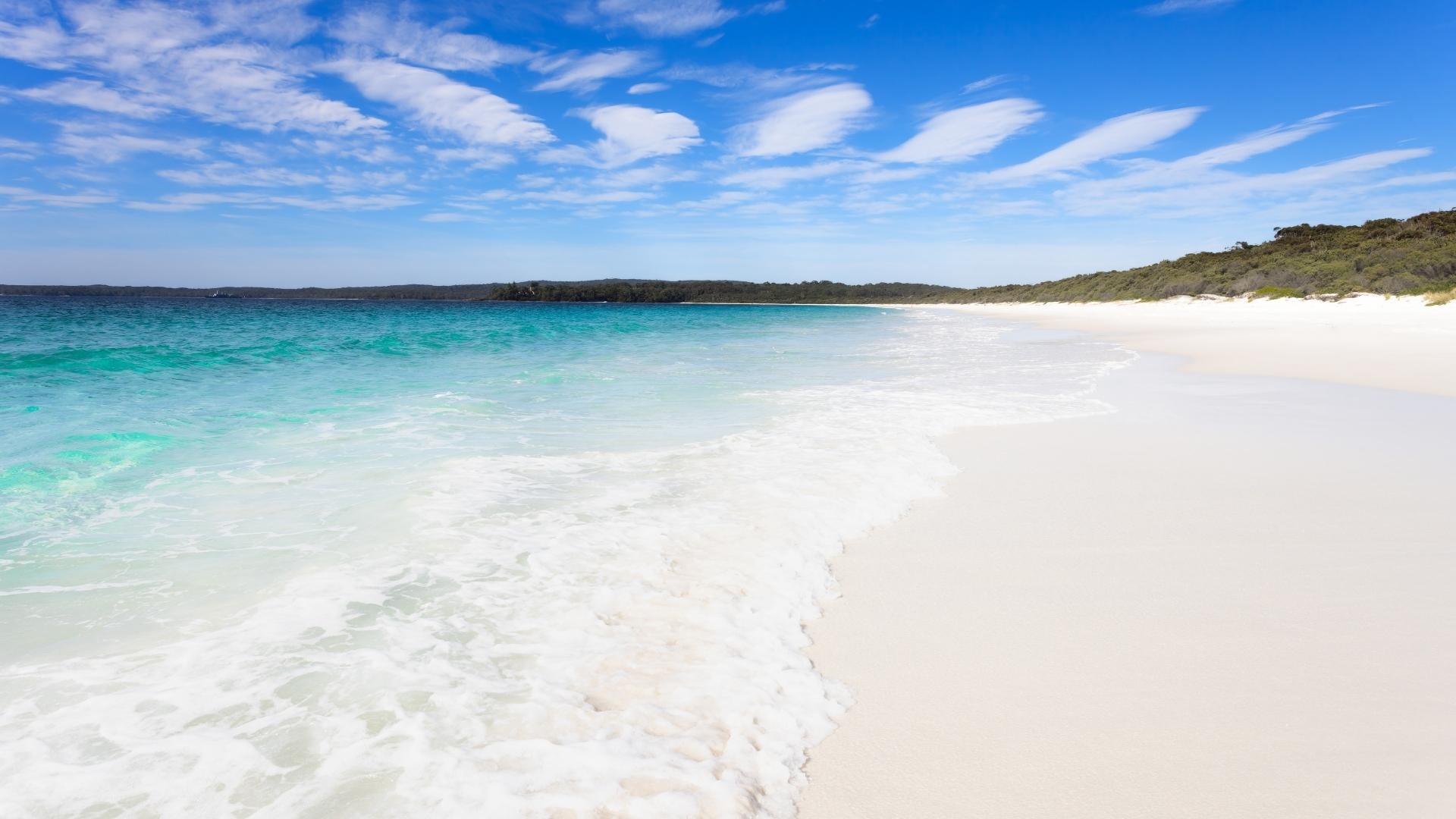 Waves and white sand on Hyams Beach Trail in Australia