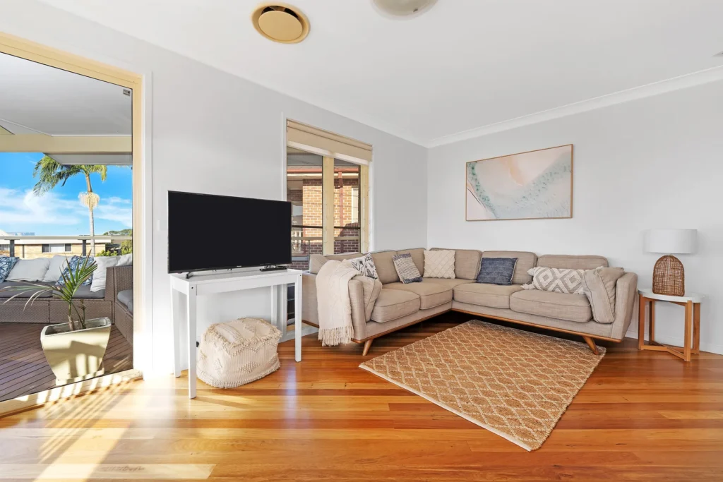 blue horizon living room, with open balcony and outside living room looking at the beach