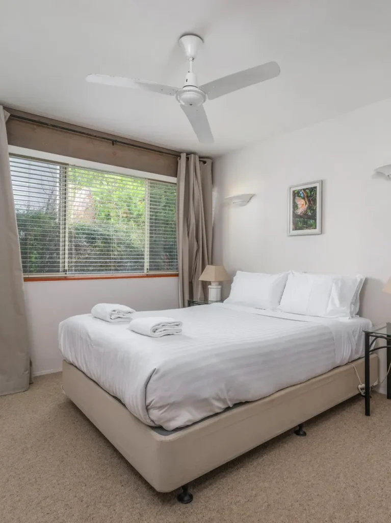 single bed in spacious bedroom