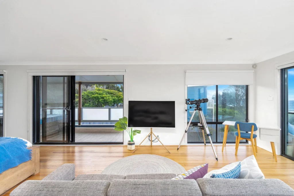 Airy lounge with ocean views at Beach Perfect, Culburra Beach