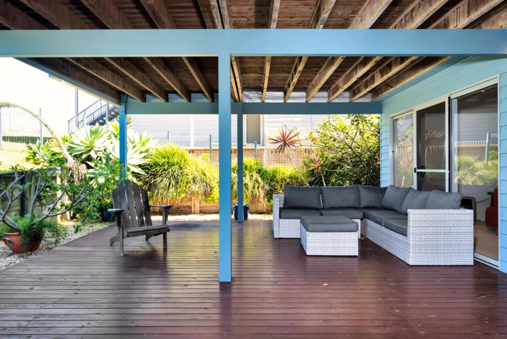 Spacious covered patio with lounge seating at Sea Dream, Culburra Beach