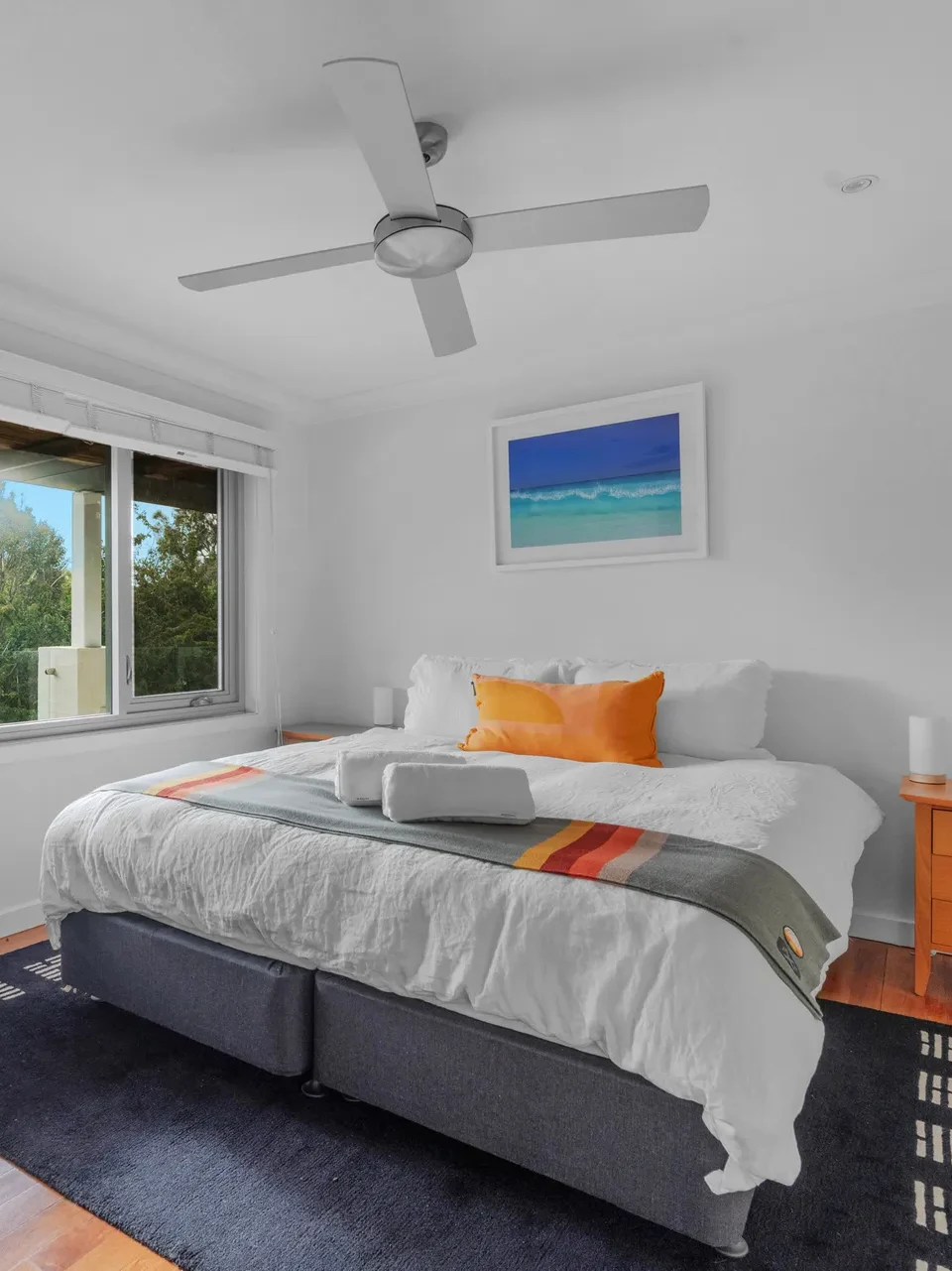 Bright coastal bedroom with garden views at Surfbreak, Culburra Beach
