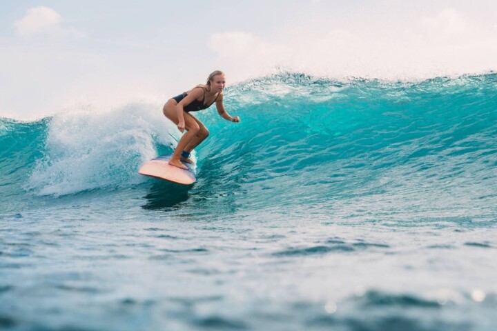 woman surfing at Culburra Beach