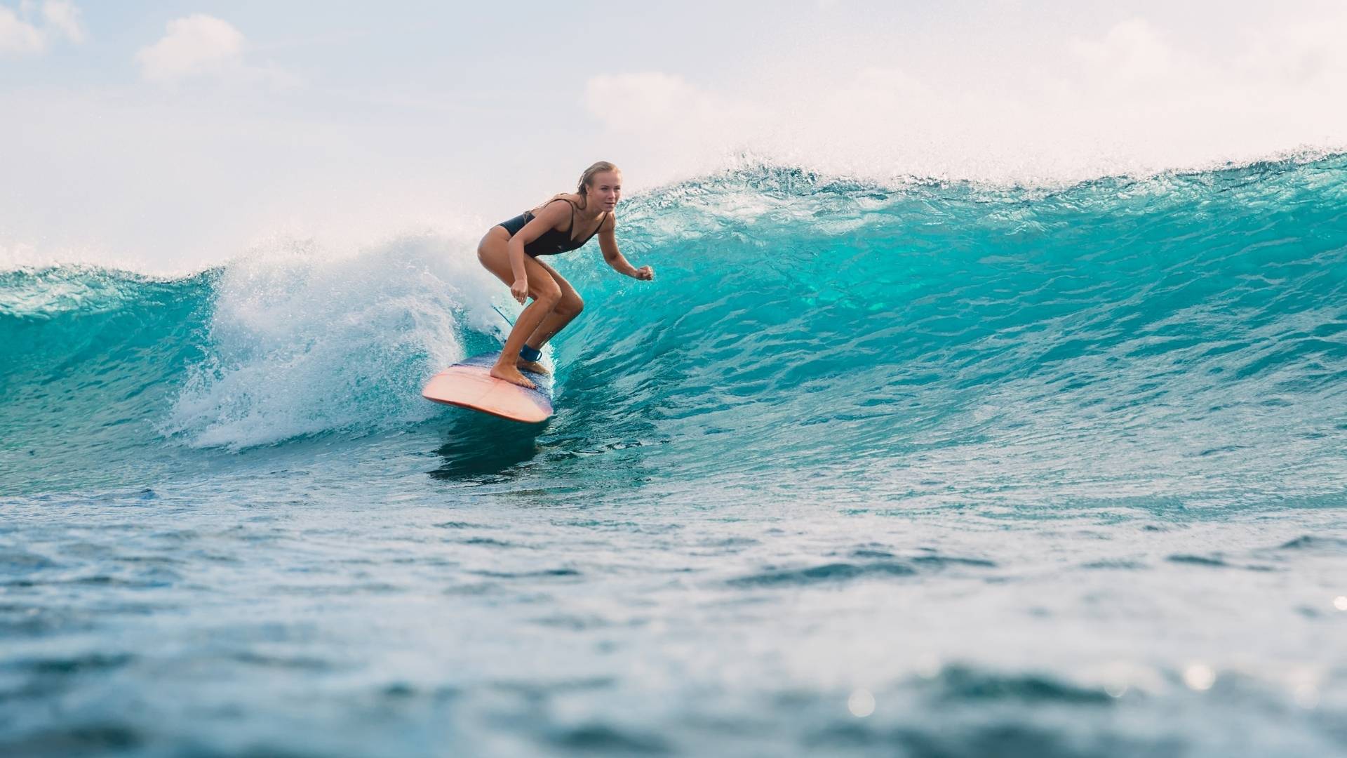 woman surfing at Culburra Beach