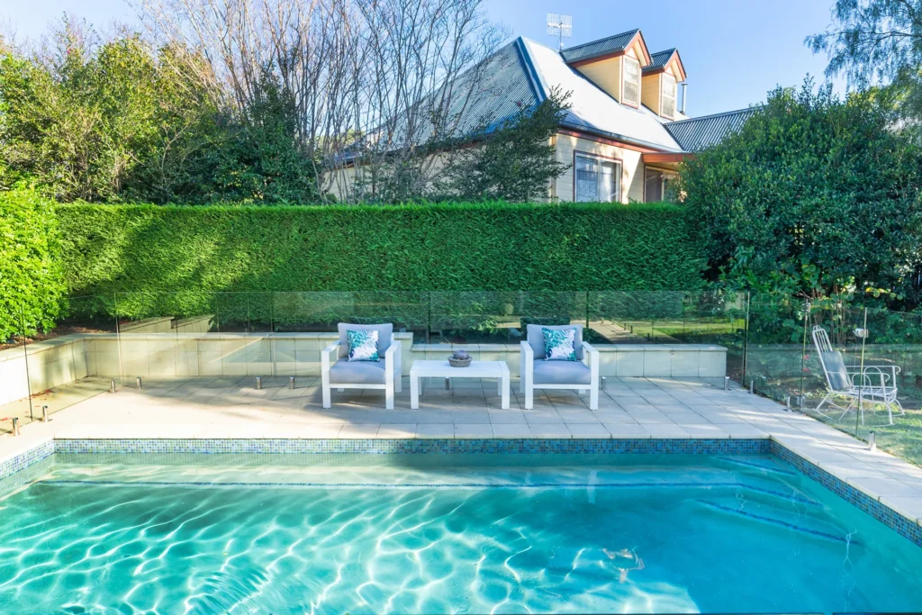 outdoor pool with fenced backyard in berry