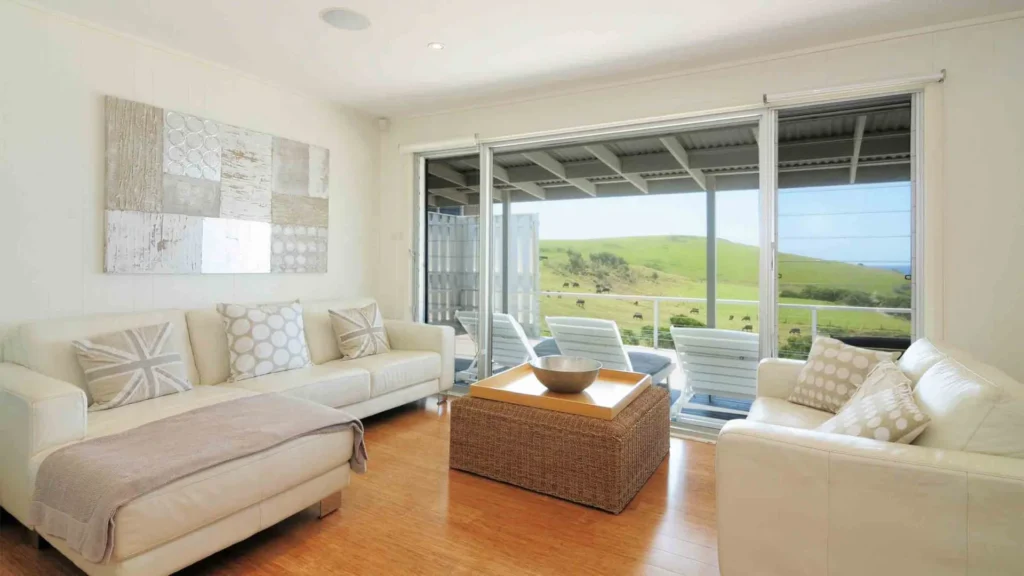 living room lokking at the rolling farm in australia