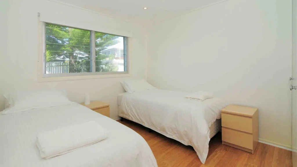 two bedroom with window room
