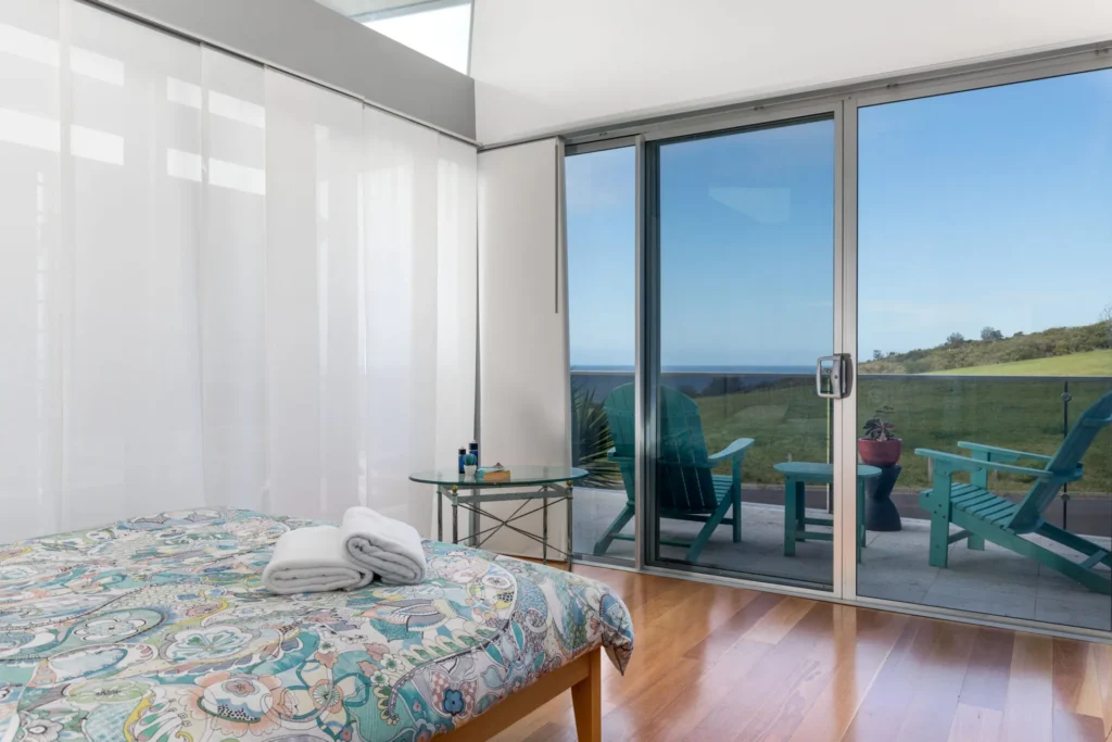 bedroom with extra terrace looking at the rolling hills