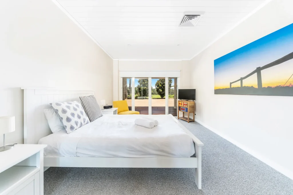 bedroom filled with natural lights in berry
