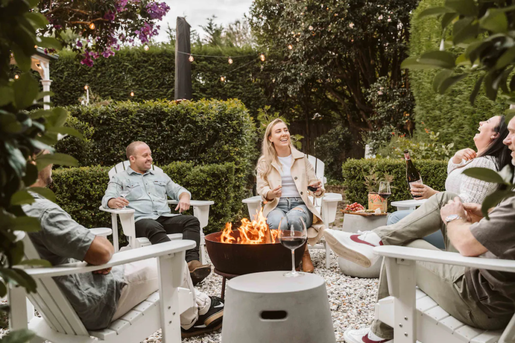 enjoy wine around a fire pit in Berry
