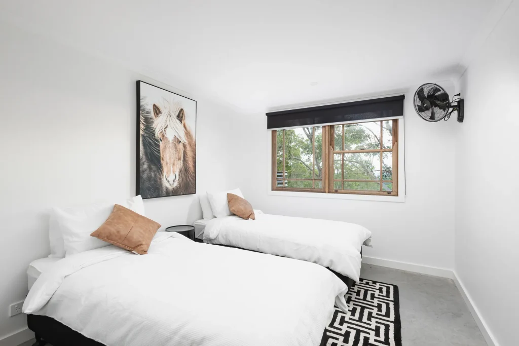 twin bedroom featuring simple modern decor
